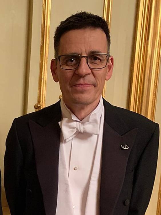 Primer plano de Didier Queloz, codescubridor del primer exoplaneta y Premio Nobel de Física 2019.